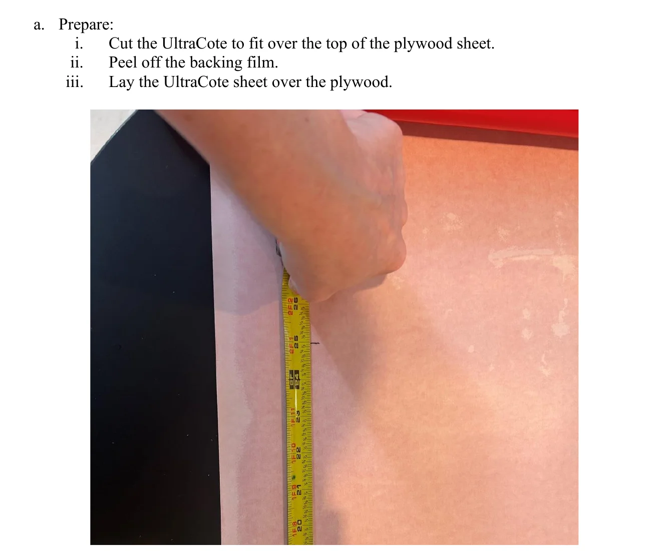 Figure 2.5 Cut UltraCote. a. Prepare: i. Cut the UltraCote to fit over the top of the plywood sheet. ii. Peel off the backing film. iii. Lay the UltraCote sheet over the plywood.